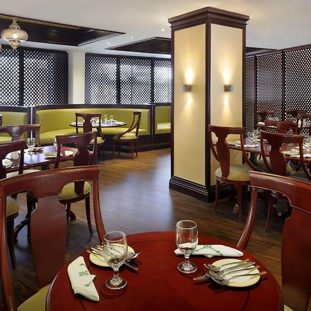 מנאמה Al Safir Hotel מסעדה תמונה